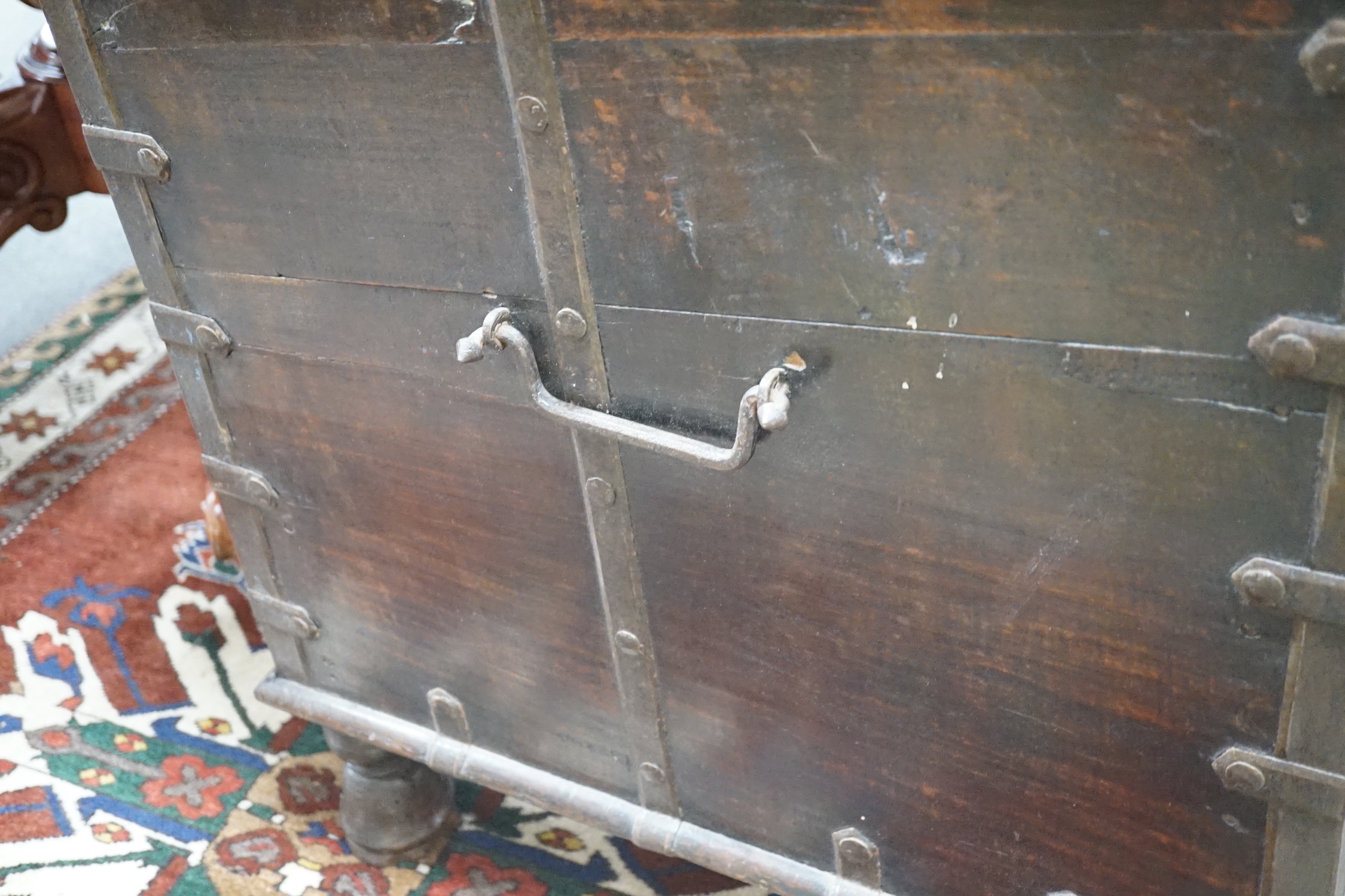 A 19th century Indian iron bound hardwood trunk, width 99cm, depth 64cm, height 70cm